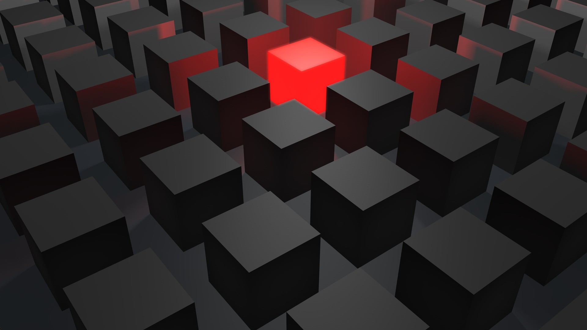 Cubes in gray with a red glowing cube